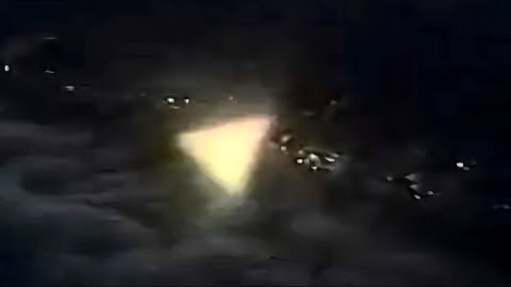 Mysterious Glowing Triangular UFO Caught By Airplane Passenger And 3 More Sightings Over