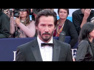 Keanu Reeves and Eli Roth on the red carpet for Knock Knock
