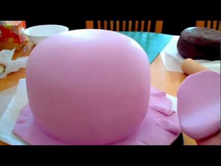 How to Smooth Fondant on an Irregular Shaped Cake (Hootabelle)