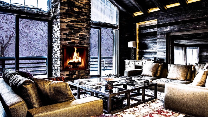 Pafuli We gather in front of a cozy fireplace in the wooden house and the snow smiles