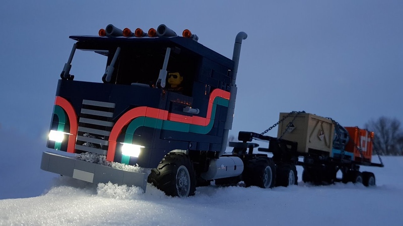 Lego truck driving through snow while synth music
